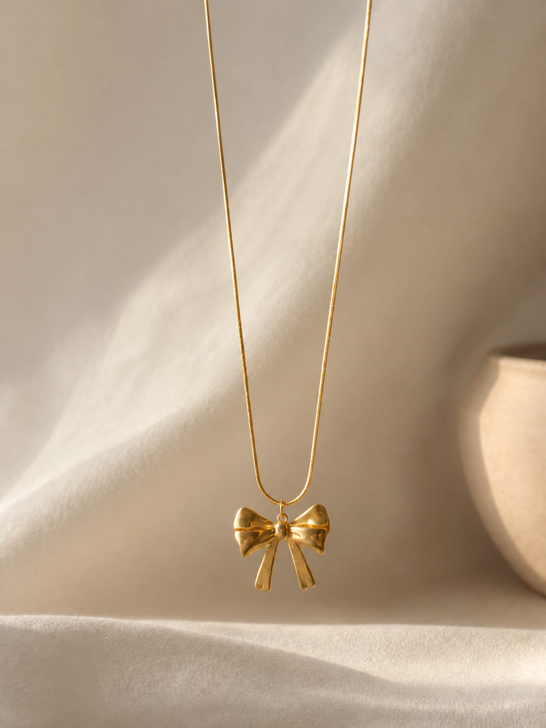 Elara Bow Pendant